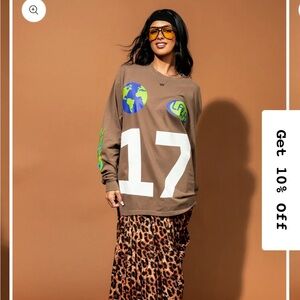 Dressed in LALA Karma’s got your back oversized long sleeve tee